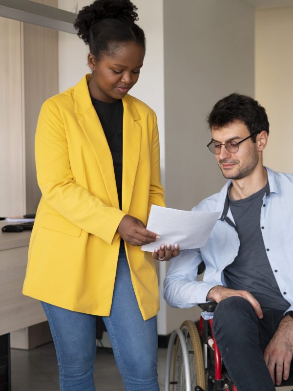 man-wheelchair-work-front-view